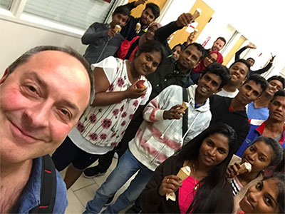 Wright takes a selfie with new friends from Sri Lanka.