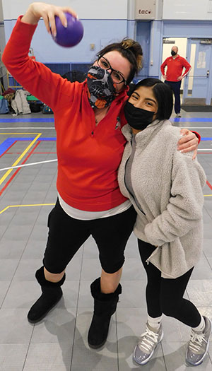 Teacher and students from West Aurora High School were all smiles behind the masks in the Anderson Hall gym.