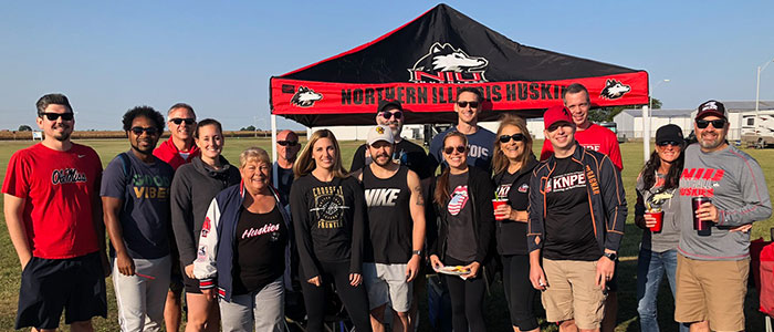 Johnston (fifth from right) and her KNPE family