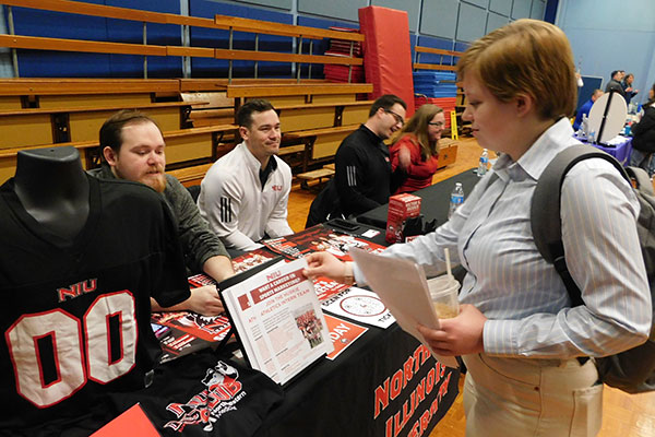 Representatives from NIU Huskie Athletics spoke to KNPE students.