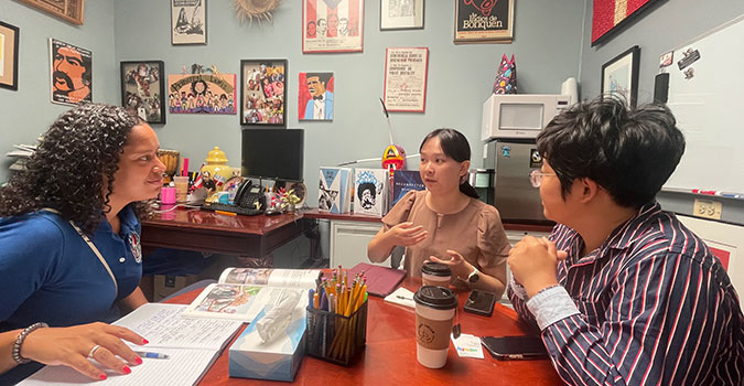 During their time in Humboldt Park, Han-Yu Wu (right) and Min-Ju Liu met with Melissa Lewis, principal of Dr. Pedro Albizu Campos High School.