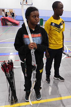 Visitors from Tanzania learned about bows and arrows from the NIU Archery Club.