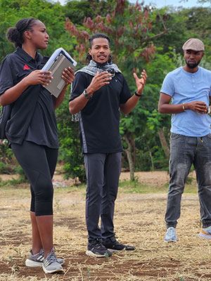 Jordyn King and Izaiah Webb lead a sports activity in Tanzania.