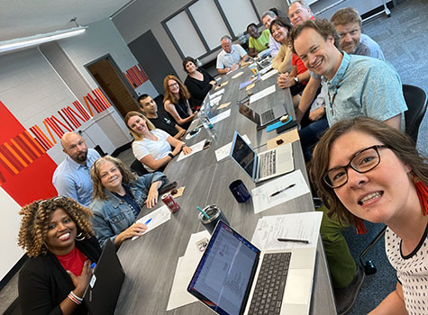 LEPF faculty and staff meet in the Educational Leadership Conference Room.