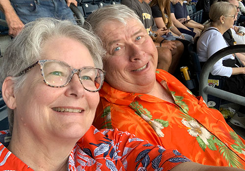 Laura Hedin and husband, Paul Donohue, on “the world’s slowest tour of all the MLB parks.”