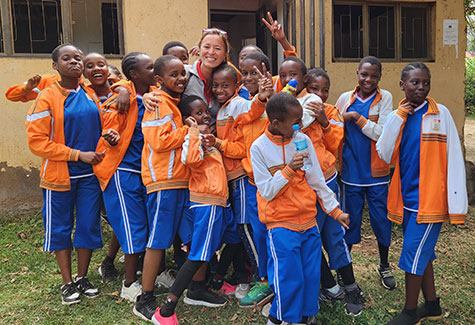 Jenn Jacobs and her new friends in Tanzania.