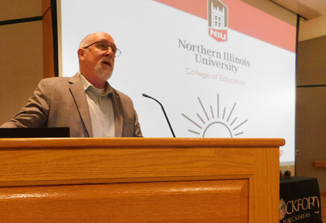 Bill Pitney speaks at the May 2023 kick-off ceremony for RISE (Rockford Inspiring School and Community Excellence).