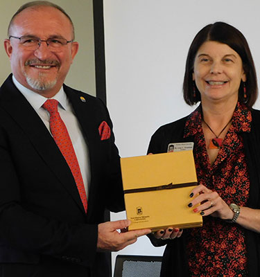 NIU President Lisa C. Freeman welcomes Vullnet Ameti, president of the Senate of the University of Tetova.