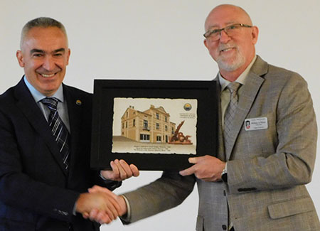 Acting Dean Bill Pitney welcomes Lulzim Mehmedi, dean of the Faculty of Pedagogy at the University of Tetova.