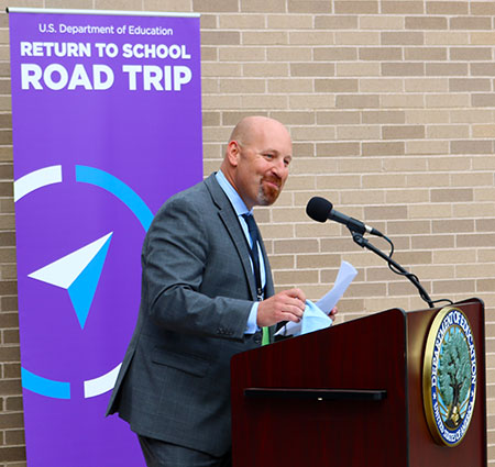Jason Dietz speaks at a news conference honoring 2021 National Blue Ribbon Schools – including Walter R. Sundling Middle School.