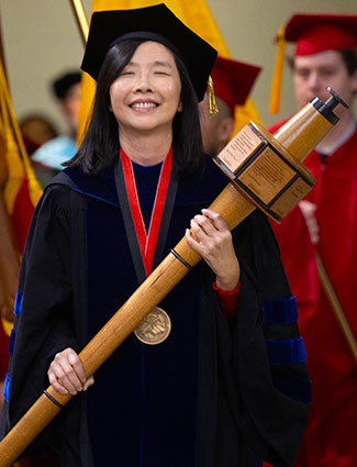 Pi-Sui Hsu at Fall 2024 commencement.