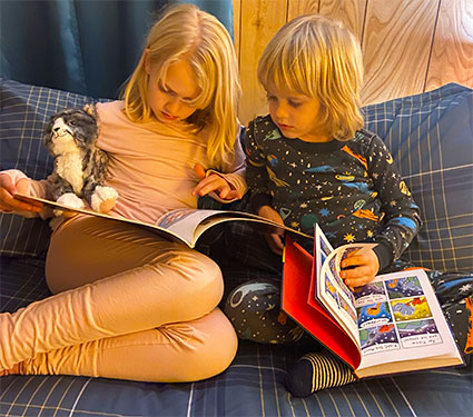 It’s in the genes: Hazel and Sam love to read, something that makes Grandma happy.