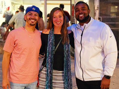 Jenn Jacobs with Tim Mack (right) – “The No. 1 FLEX GA of all time!” – and KNPE alum Jake Diaz.
