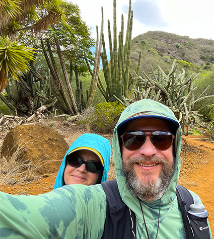 Jill Franke and David Walker hiking in Oahu, Hawaii.