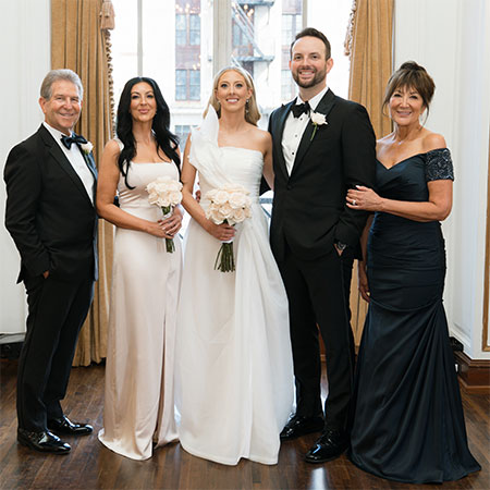Wedding bells: The Surbers with their son, Jon, and his bride, Jessica – and, next to Jim, their daughter, Jessica.