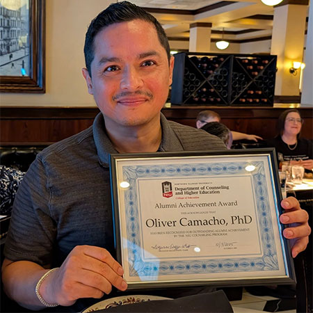 Oliver Camacho, the Department of Counseling and Higher Education’s 2025 Alum of the Year.