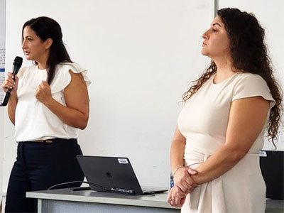 Dana Isawi (left) and Yenitza Guzman lead a workshop.