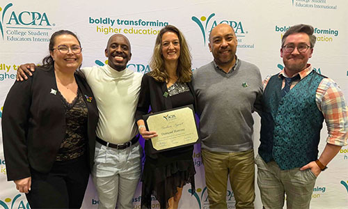 Gudrun Nyunt (center) and colleagues at the ACPA annual convention in Baltimore.